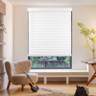 faux wood blinds in white with adjustable slats for light control and privacy.