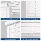 faux wood blinds in white with adjustable slats for light control and privacy.